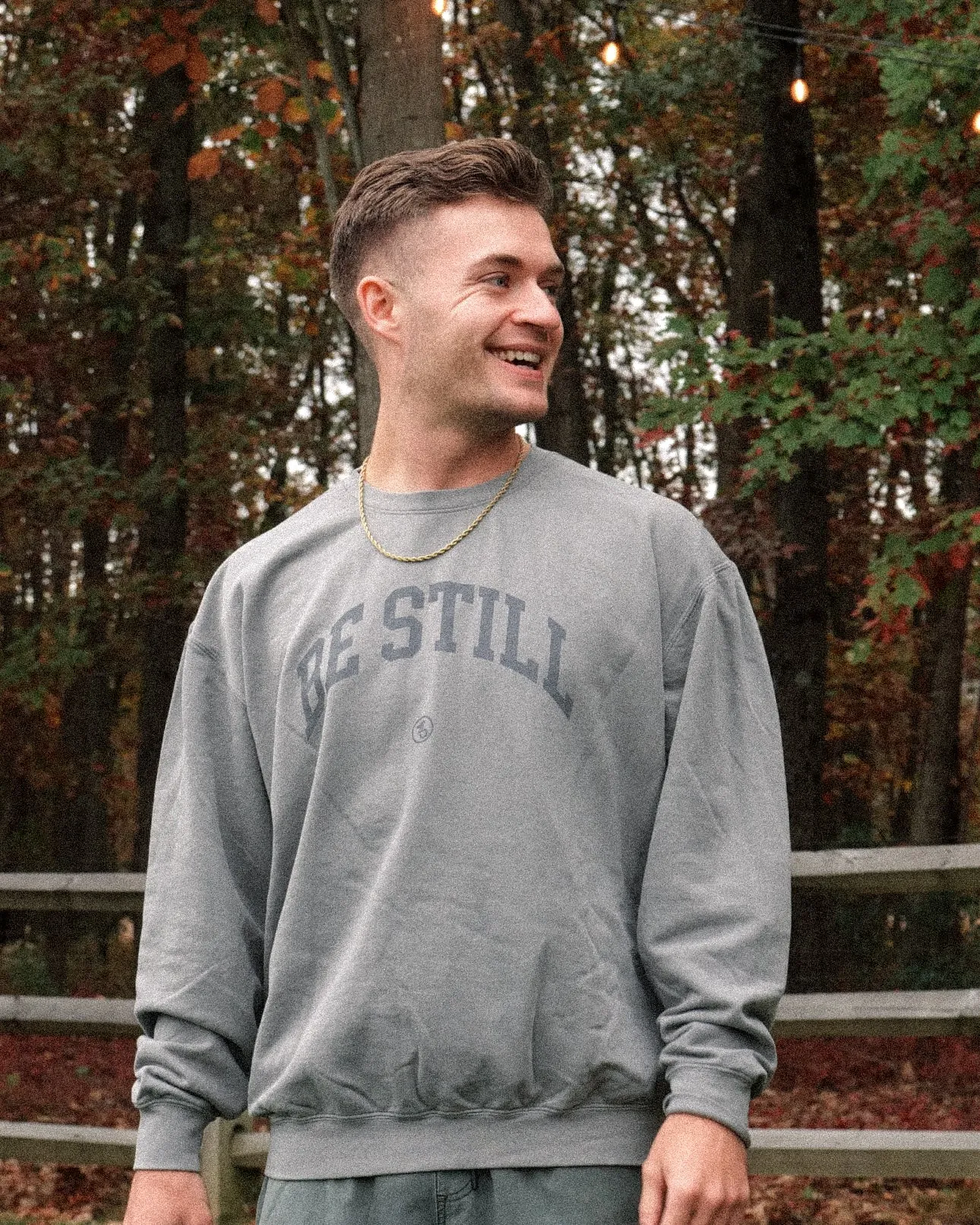 BE STILL University Style Crewneck Sweatshirt
