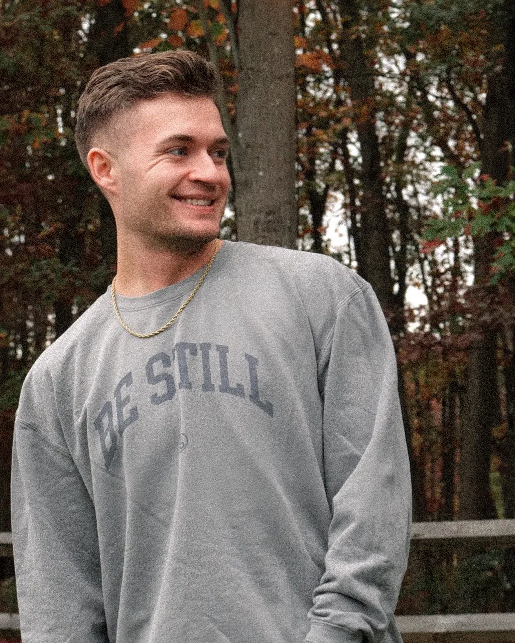 BE STILL University Style Crewneck Sweatshirt